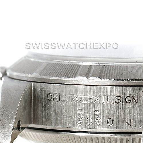 This image shows a side view of the Rolex Oyster Perpetual 76030 Women's Stainless Steel Pink Dial 76030 Women's Stainless Steel Pink Dial watch case, highlighting the model number and "ORIG. ROLEX DESIGN" engraving.