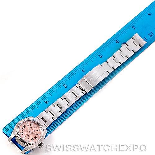 This image shows a Rolex Oyster Perpetual 176234 Women's Stainless Steel Pink Dial 176234 Women's Stainless Steel Pink Dial watch, focusing on the watch face, bracelet, and clasp, laid next to a ruler for scale.