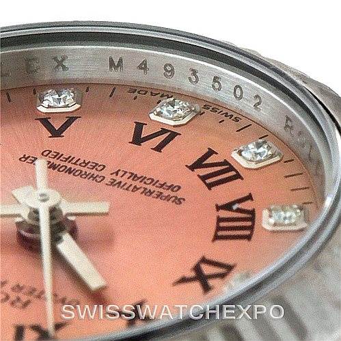 This image shows a close-up of the dial and bezel of a Rolex Oyster Perpetual 176234 Women's Stainless Steel Pink Dial 176234 Women's Stainless Steel Pink Dial watch, highlighting the Roman numerals and diamond hour markers.