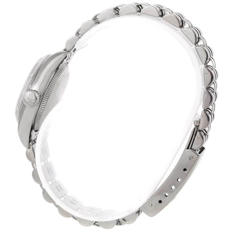 This image shows a side view of the case and bracelet of a Rolex Oyster Perpetual 67230 Women's Stainless Steel Blue Dial 67230 Women's Stainless Steel Blue Dial watch.