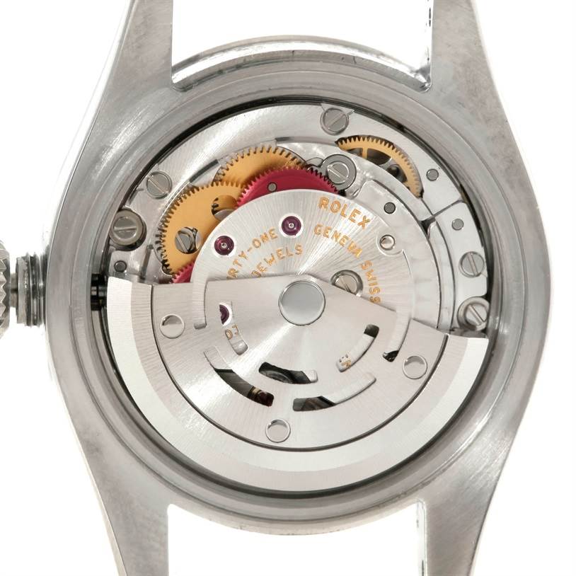 The image shows the internal movement mechanism of a Rolex Oyster Perpetual 176200 Women's Stainless Steel Blue Dial 176200 Women's Stainless Steel Blue Dial watch from a rear angle.