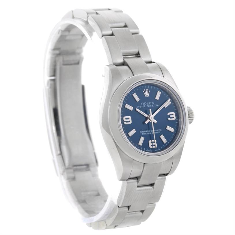 The image shows a Rolex Oyster Perpetual 176200 Women's Stainless Steel Blue Dial 176200 Women's Stainless Steel Blue Dial watch from an angle showcasing the blue dial, case, and metal bracelet.