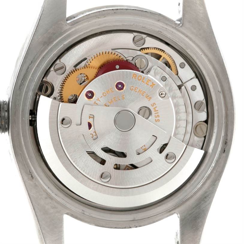 The image shows the inner mechanism and movement components of the Rolex Oyster Perpetual 176200 Women's Stainless Steel White Dial 176200 Women's Stainless Steel White Dial watch from a rear angle.