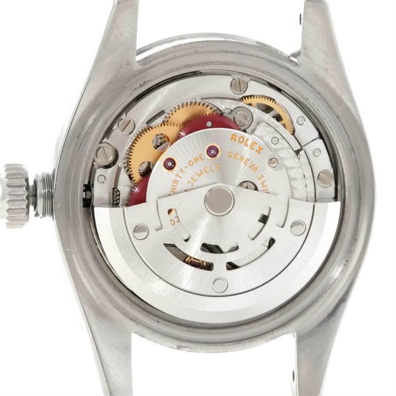 This image shows the movement and internal mechanics of a Rolex Oyster Perpetual 176200 Women's Stainless Steel White Dial 176200 Women's Stainless Steel White Dial watch from the back side.