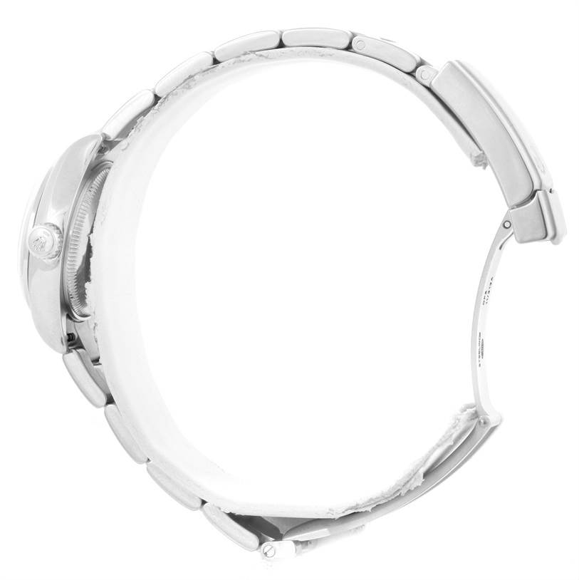 This side view image shows the Rolex Oyster Perpetual 176200 Women's Stainless Steel Silver Dial 176200 Women's Stainless Steel Silver Dial watch, highlighting the case, crown, and bracelet.