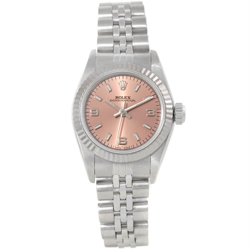 The image shows a frontal view of a Rolex Oyster Perpetual 67194 Women's Stainless Steel Pink Dial 67194 Women's Stainless Steel Pink Dial watch with its face, bezel, and bracelet visible.