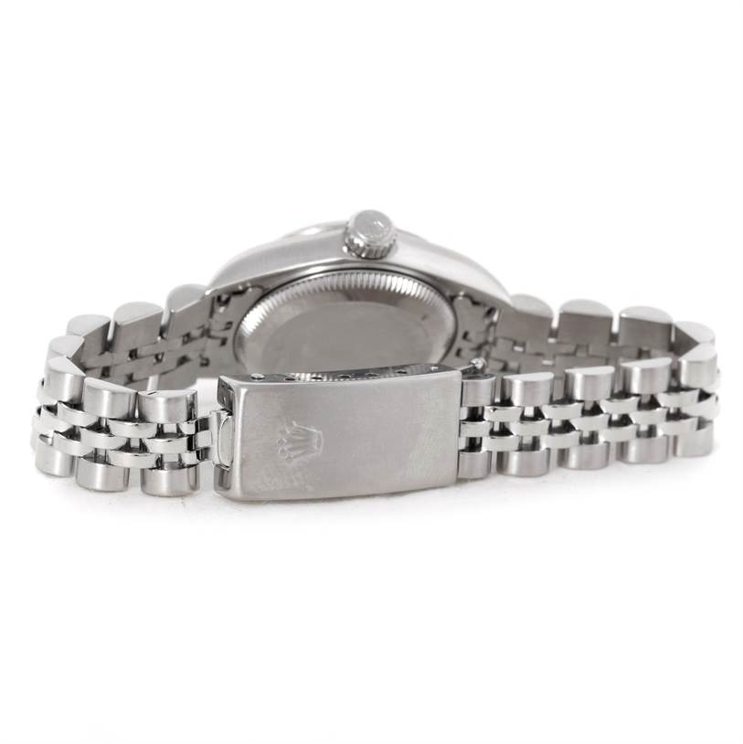 The image shows the back case and bracelet clasp of a Rolex Oyster Perpetual 67194 Women's Stainless Steel Pink Dial 67194 Women's Stainless Steel Pink Dial watch, viewed from the rear.