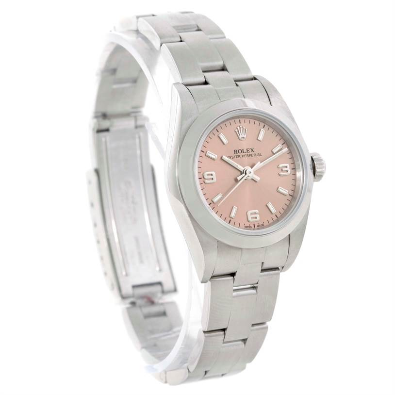 The Rolex Oyster Perpetual 76080 Women's Stainless Steel Pink Dial 76080 Women's Stainless Steel Pink Dial watch is shown from a front-right angle, displaying its pink dial and stainless steel bracelet.