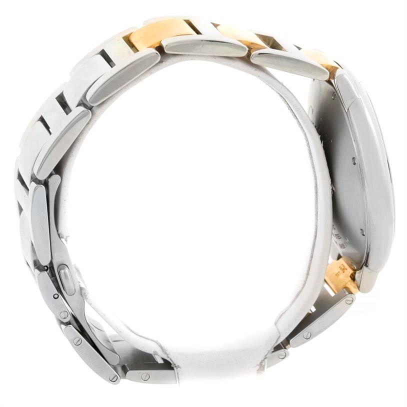 The image shows the side view of a Ballon Bleu by Cartier, highlighting the bracelet and side profile of the case.