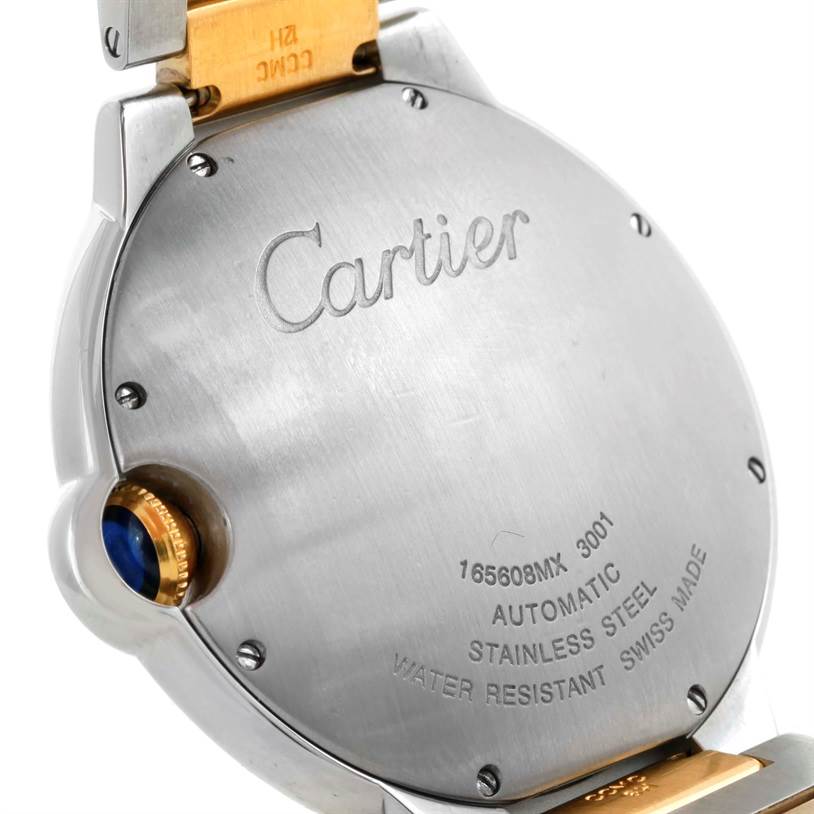 The image shows the back case and part of the strap attachment of a Cartier Ballon Bleu W69009Z3 Men's Stainless Steel Silver Dial W69009Z3 Men's Stainless Steel Silver Dial watch.