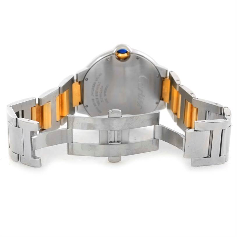 The image shows the back of a Cartier Ballon Bleu W69009Z3 Men's Stainless Steel Silver Dial W69009Z3 Men's Stainless Steel Silver Dial watch, focusing on the clasp and part of the metal bracelet with gold accents.