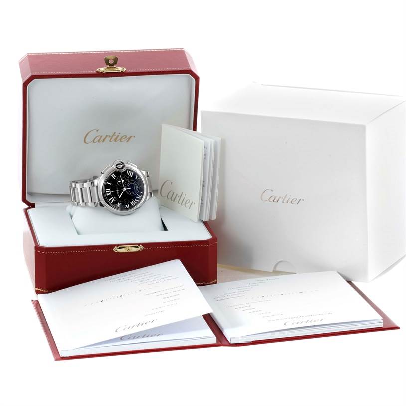 The image displays a Cartier Ballon Bleu W6920077 Men's Stainless Steel Grey Dial W6920077 Men's Stainless Steel Grey Dial watch at a slight angle inside its open red case, with accompanying booklets and outer packaging visible.