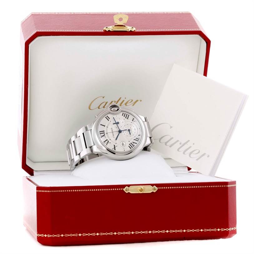 The Cartier Ballon Bleu W6920002 Men's Stainless Steel Silver Dial W6920002 Men's Stainless Steel Silver Dial watch is displayed at a front angle in an open red box, with a booklet beside it.