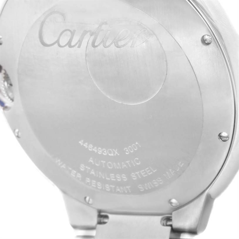 The image shows the back case of a Ballon Bleu model by Cartier, highlighting the brand engraving and specifications.
