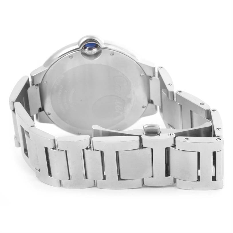 The image shows a rear view of a Ballon Bleu model by Cartier, focusing on the case back and part of the bracelet.