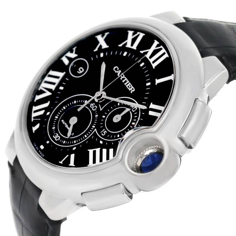 The image captures a Cartier Ballon Bleu W6920052 Men
s Stainless Steel Black Dial W6920052 Men
s Stainless Steel Black Dial watch at an angled view, highlighting its black leather strap, silver casing, and blue cabochon crown.