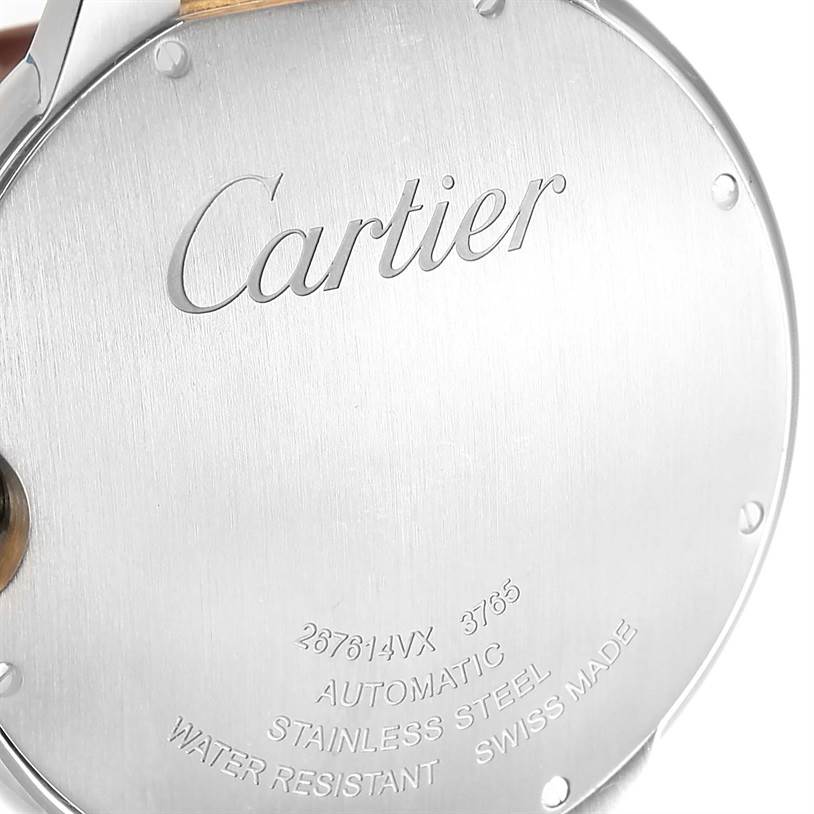 The image shows the back case of a Ballon Bleu watch by Cartier, highlighting its inscriptions and metal finish.