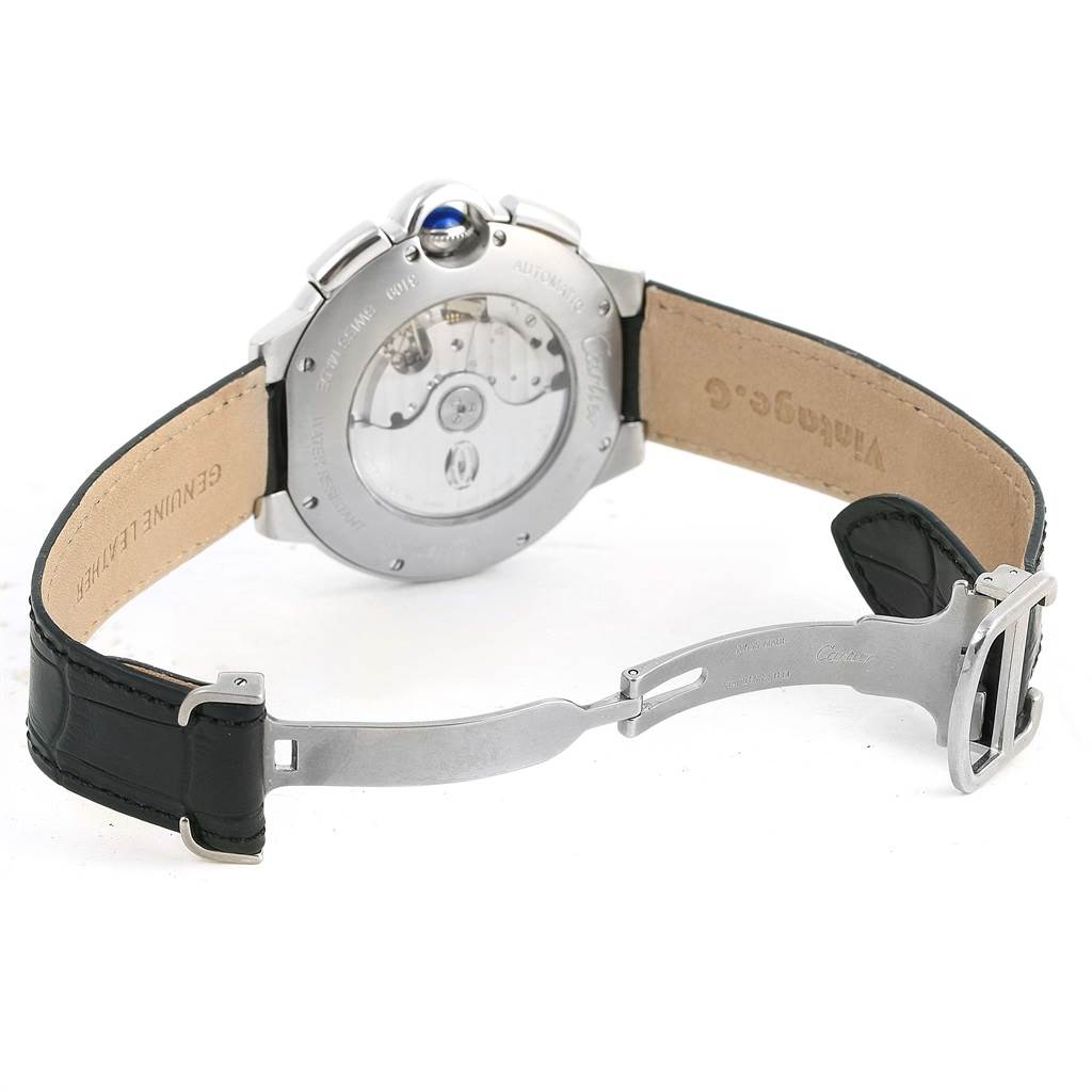 The image shows the back view of a Cartier Ballon Bleu W6920052 Men's Stainless Steel Black Dial W6920052 Men's Stainless Steel Black Dial watch, highlighting the open clasp, leather strap, and case back.