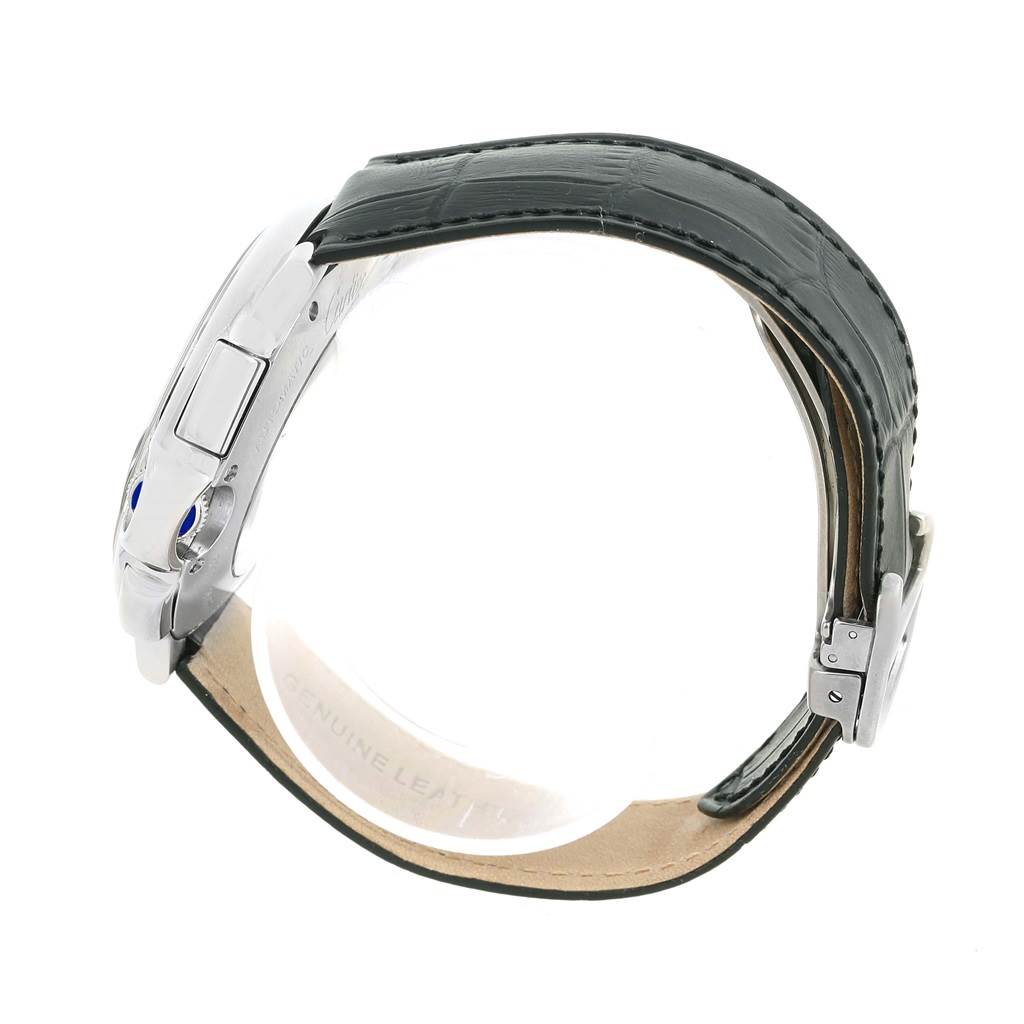 The image shows a side view of a Cartier Ballon Bleu W6920052 Men's Stainless Steel Black Dial W6920052 Men's Stainless Steel Black Dial watch, featuring its case, crown, and leather strap.