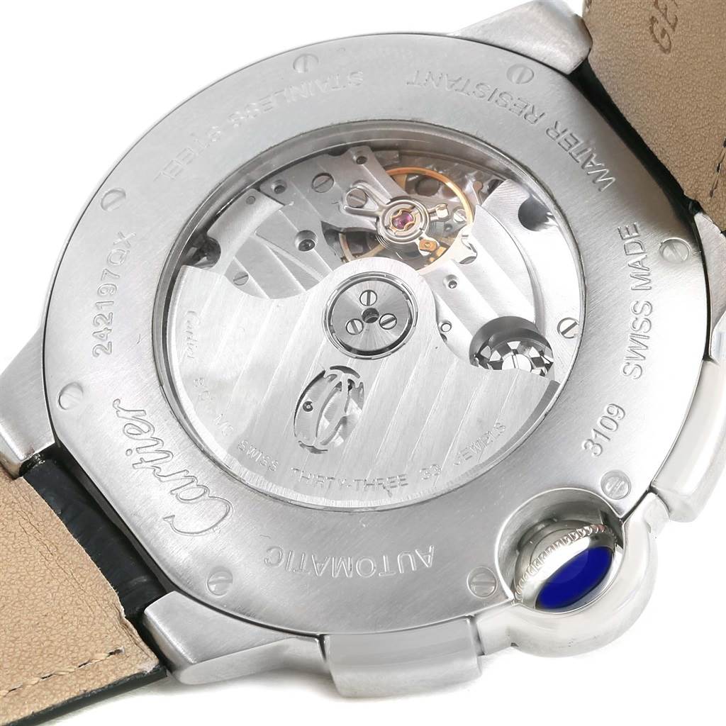 The image shows the back of the Cartier Ballon Bleu W6920052 Men's Stainless Steel Black Dial W6920052 Men's Stainless Steel Black Dial watch, highlighting its exposed automatic movement and metal casing.