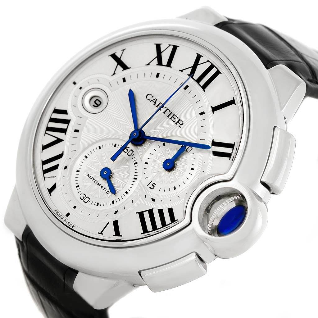 The image shows a Cartier Ballon Bleu W6920003 Men
s Stainless Steel Silver Dial W6920003 Men
s Stainless Steel Silver Dial watch from an angled view, highlighting its dial, blue hands, Roman numerals, and leather strap.