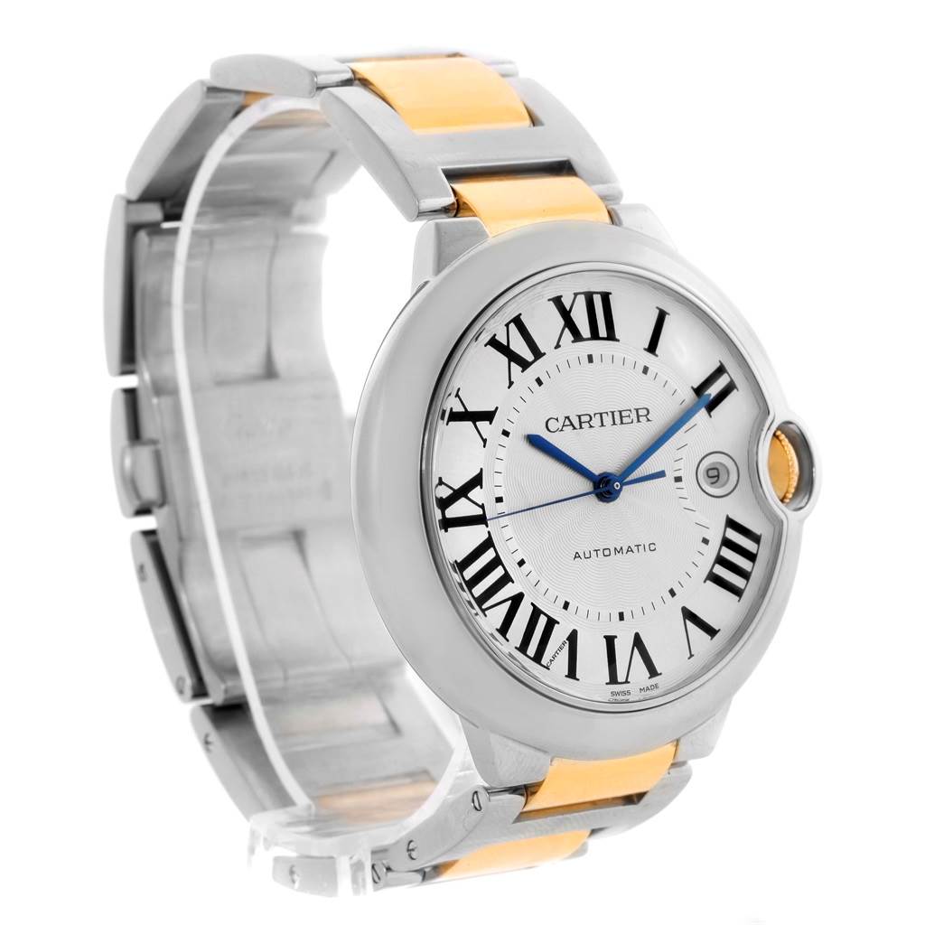 The image shows a Ballon Bleu de Cartier watch from an angled side view, highlighting its round case, crown, and two-tone bracelet.