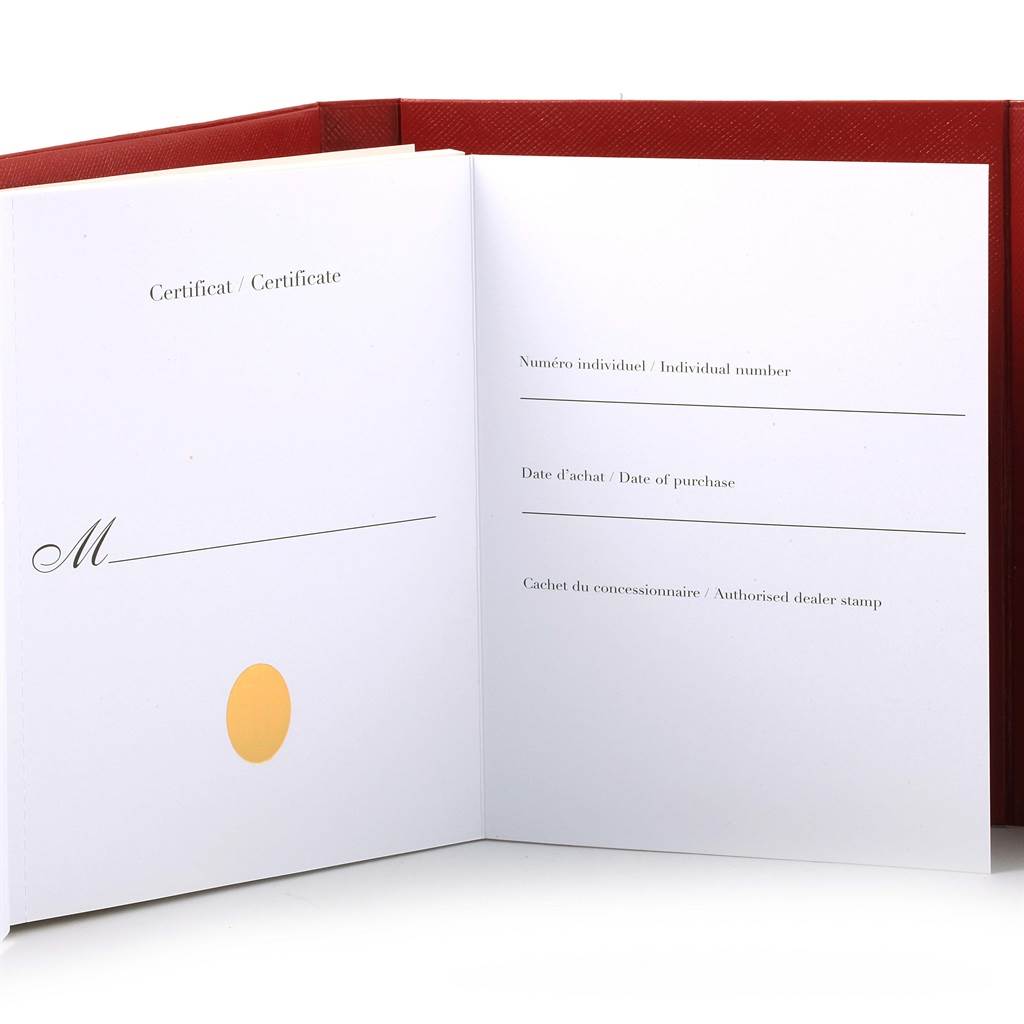 This image shows the certificate booklet for a Cartier Ballon Bleu W6920002 Stainless Steel Silver Dial W6920002 Stainless Steel Silver Dial watch, open to display the blank certification details.