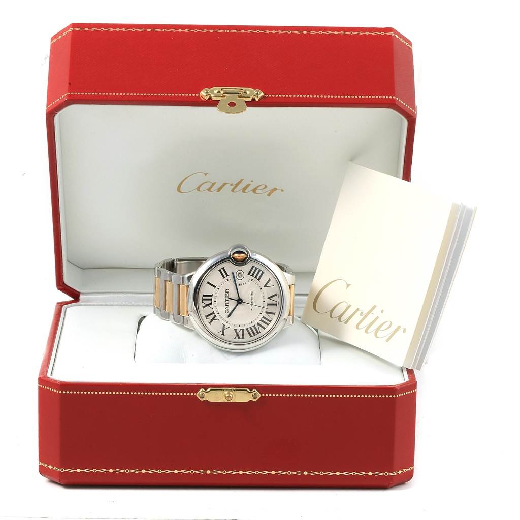 The image shows a Cartier Ballon Bleu W69009Z3 Men's Stainless Steel Silver Dial W69009Z3 Men's Stainless Steel Silver Dial watch in a red Cartier box with its booklet, viewed from the front.