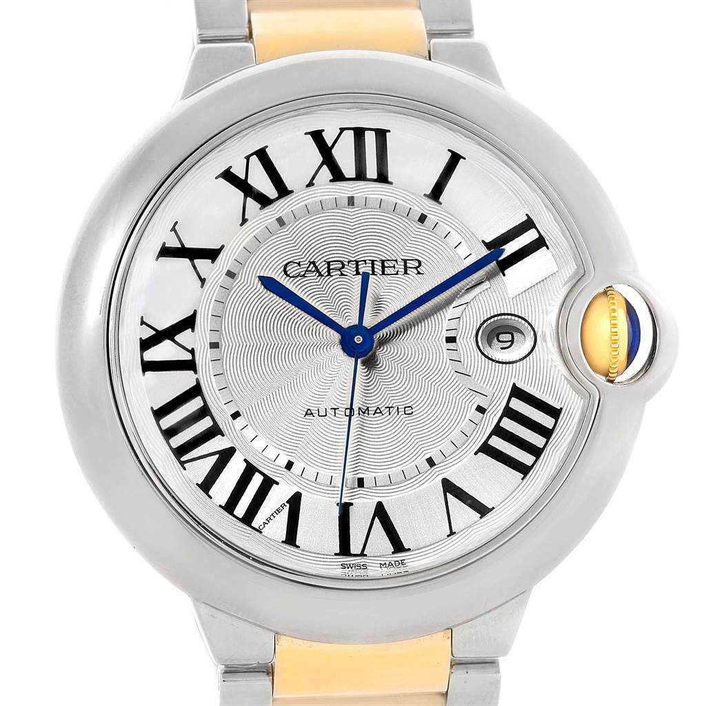 The image shows a frontal view of a Cartier Ballon Bleu W69009Z3 Men's Stainless Steel Silver Dial W69009Z3 Men's Stainless Steel Silver Dial watch, highlighting its dial, Roman numerals, blue hands, and date window.