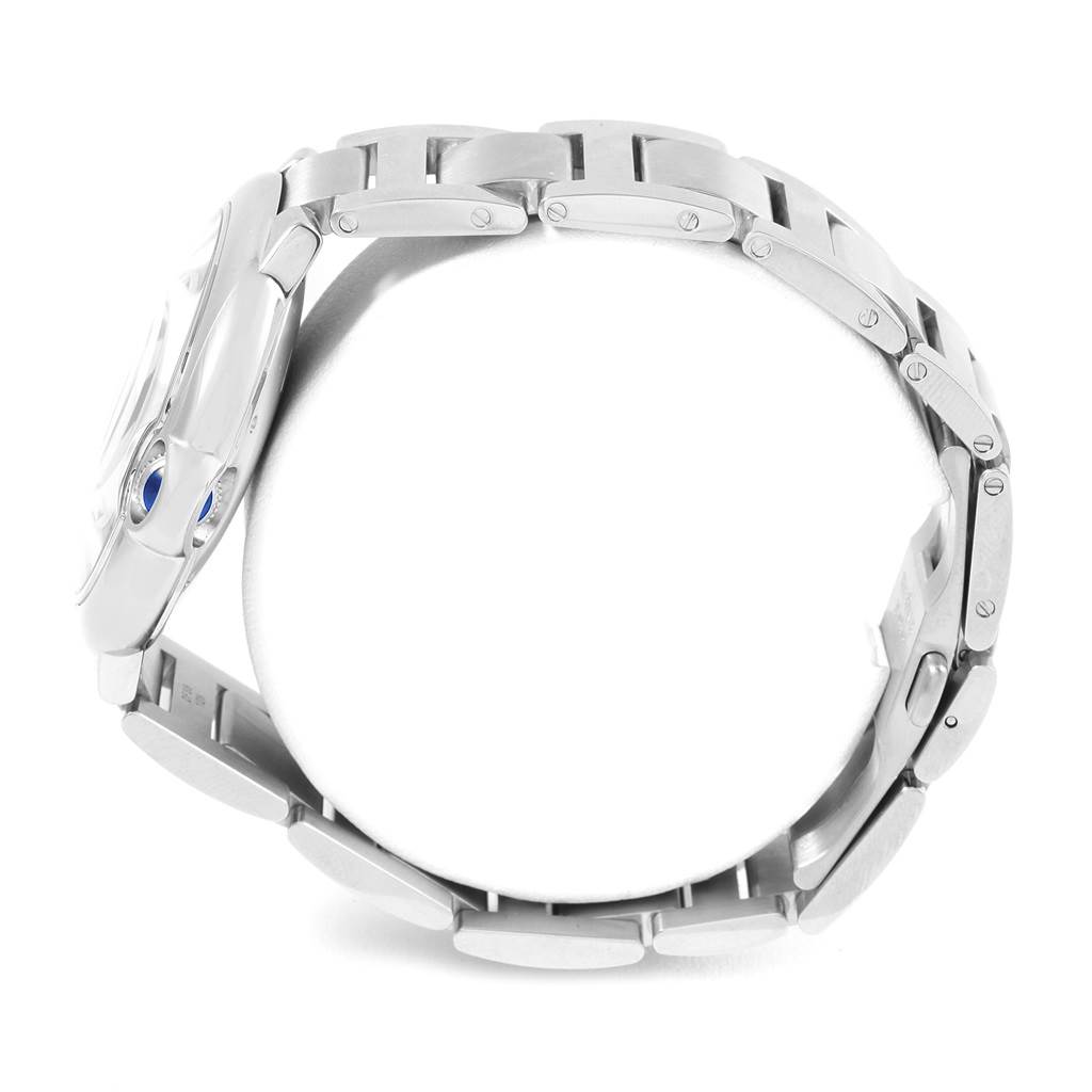 The image shows a side view of the Ballon Bleu by Cartier, highlighting its bracelet and partially visible crown.