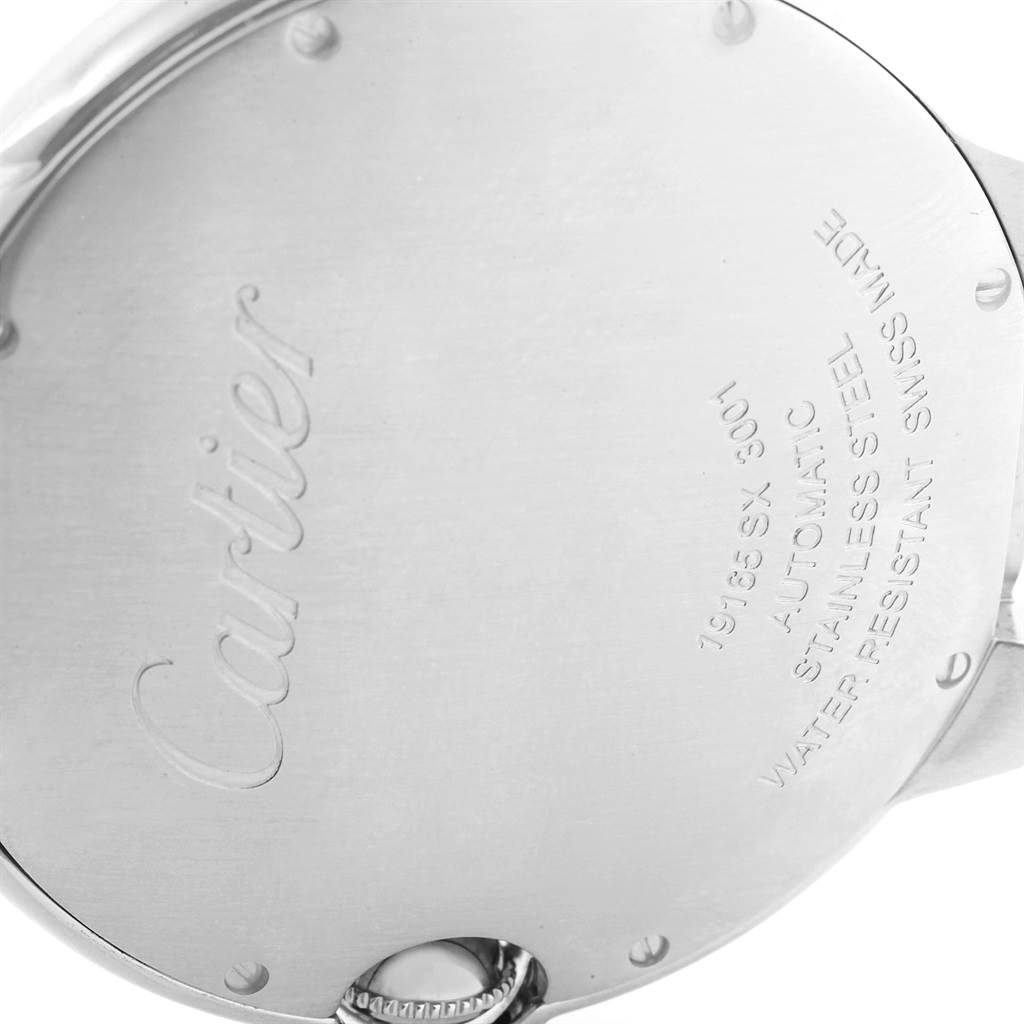 The image shows the back case of a Ballon Bleu model by Cartier, highlighting the brand engraving and watch details.