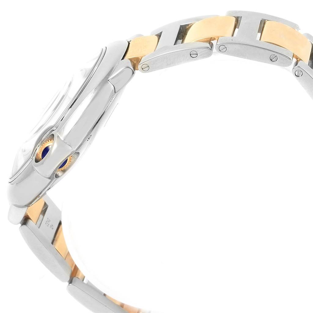 The image shows the side view of a Cartier Ballon Bleu W69009Z3 Men's Stainless Steel Silver Dial W69009Z3 Men's Stainless Steel Silver Dial watch, focusing on its crown and two-tone metal bracelet.