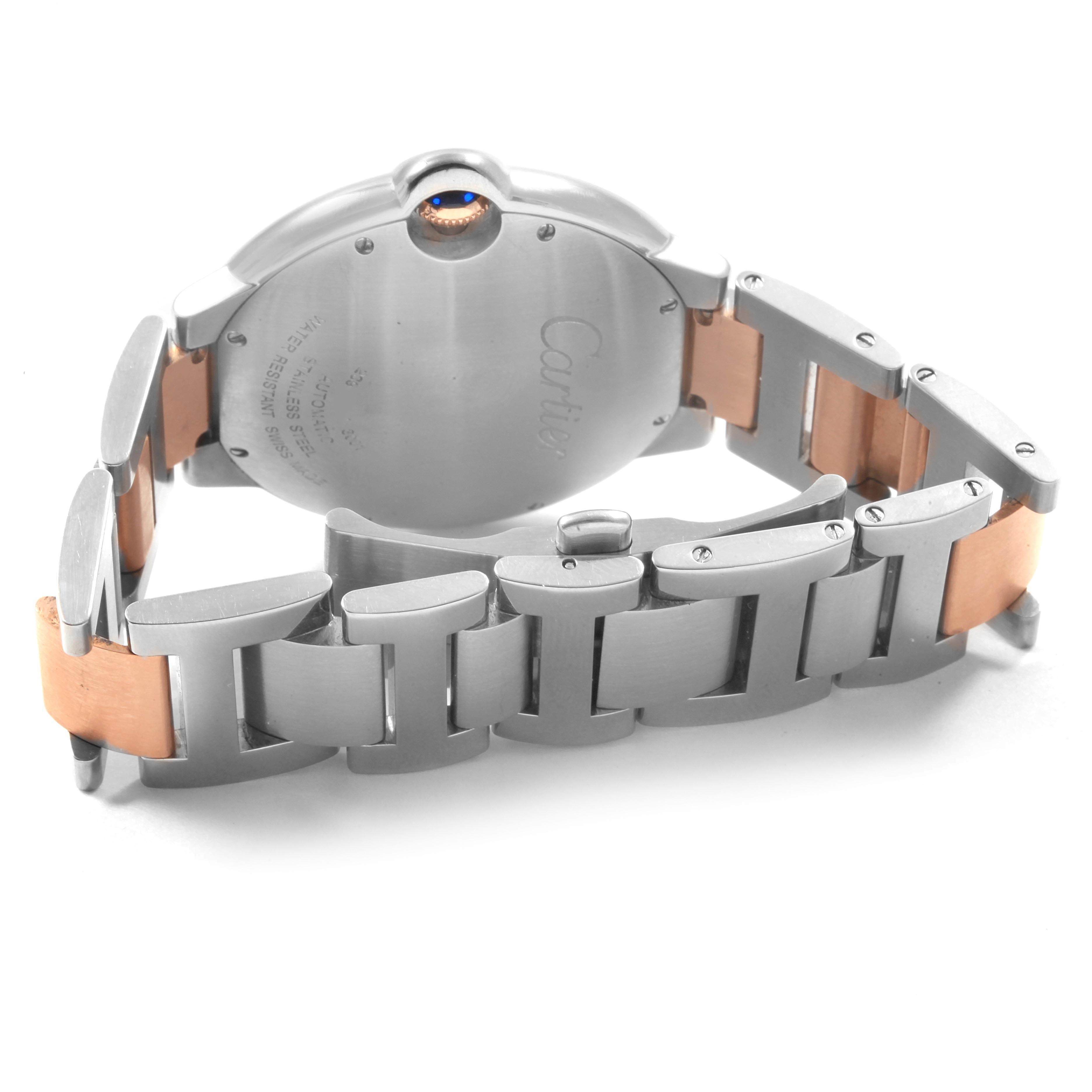 The image shows the back case and partly opened bracelet of a Cartier Ballon Bleu W6920032 Men's Steel and Gold (two tone) Brown Dial W6920032 Men's Steel and Gold (two tone) Brown Dial watch from a rear angle.