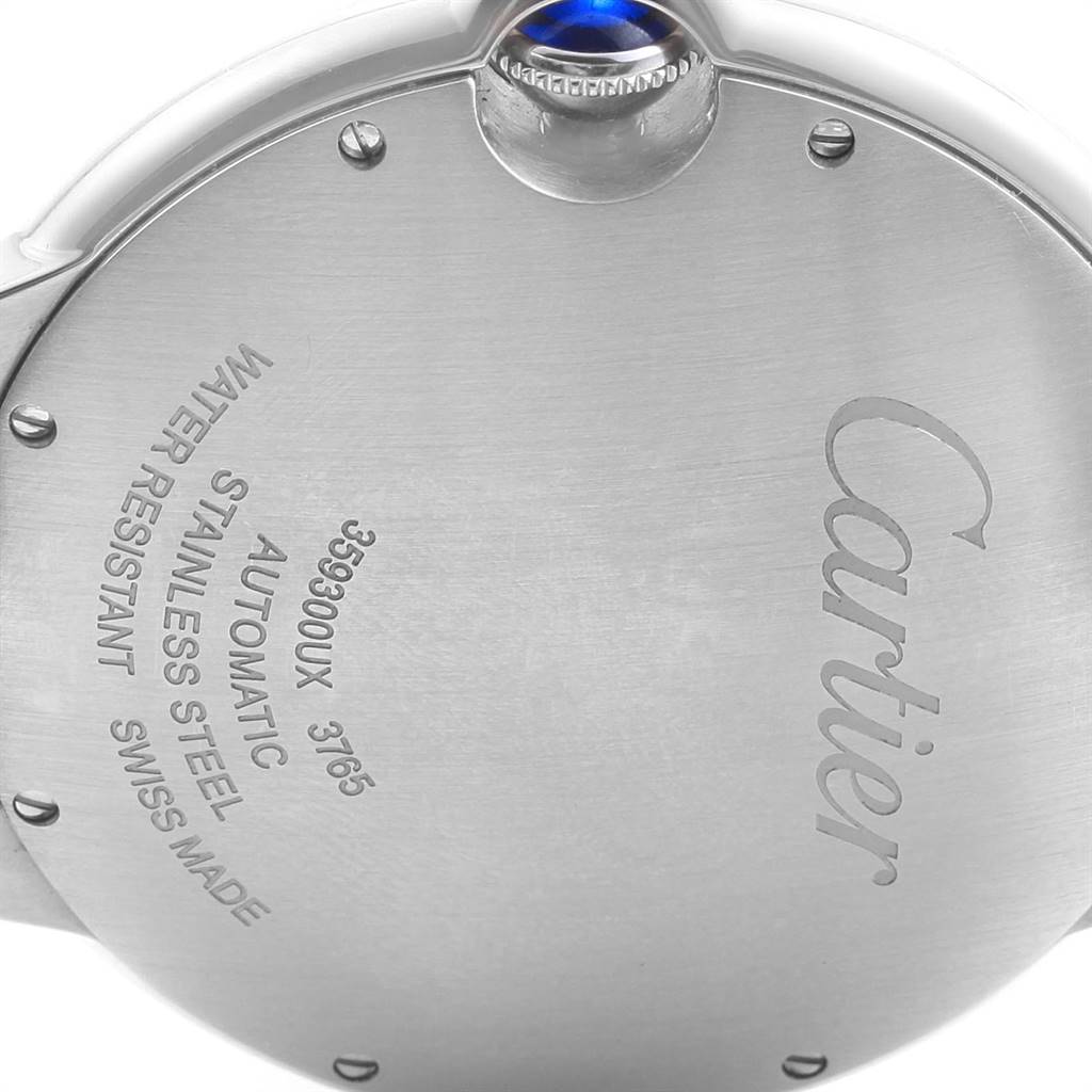 The image shows the case back and crown of a Ballon Bleu model by Cartier.