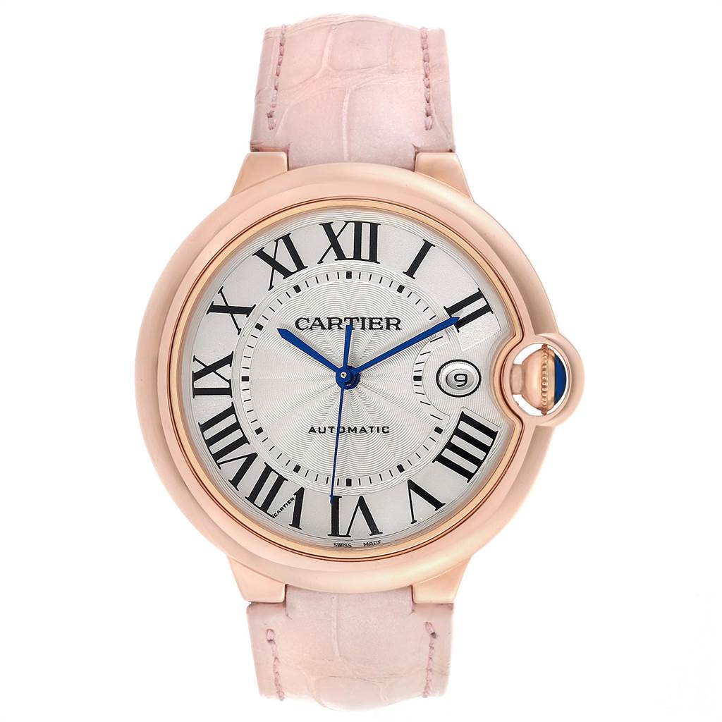 This Ballon Bleu model by Cartier is shown from the front, displaying the face, Roman numerals, and a pink leather strap.