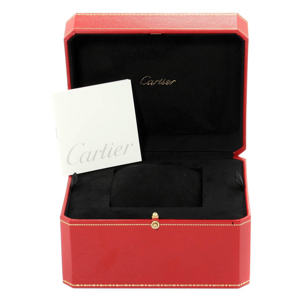 The image shows an open red Cartier box with black interior for a Ballon Bleu model watch and an instruction booklet.