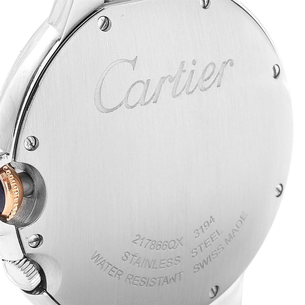 The image shows the back view of a Cartier Ballon Bleu W6920027 Men's Steel and Gold (two tone) Silver Dial W6920027 Men's Steel and Gold (two tone) Silver Dial watch, highlighting the engraved brand name and other specifications.