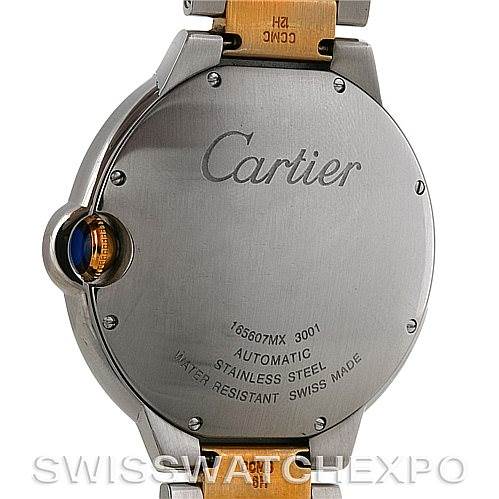 The image shows the back of a Ballon Bleu watch by Cartier, highlighting the case back and part of the stainless steel bracelet.
