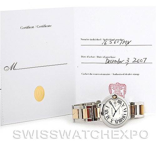 The image shows a Ballon Bleu model by Cartier, with its round face and bracelet, accompanied by its certificate of Best Quality
ity.