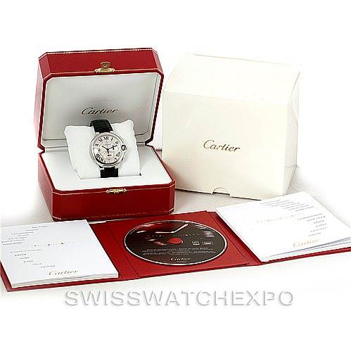 The image shows a Cartier Ballon Bleu W6920003 Men
s Stainless Steel Silver Dial W6920003 Men
s Stainless Steel Silver Dial watch, box, warranty card, manual, and a CD.