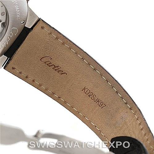 This image shows the back side of a leather strap of a Ballon Bleu watch by Cartier, displaying the Cartier logo and a serial number.