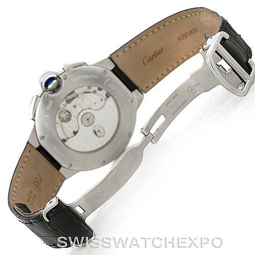 The image shows the back view and part of the leather strap of a Ballon Bleu model by Cartier, highlighting its automatic movement and clasp.