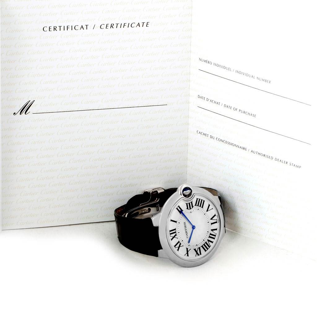 The image shows a side view of the Ballon Bleu de Cartier watch along with its certificate.