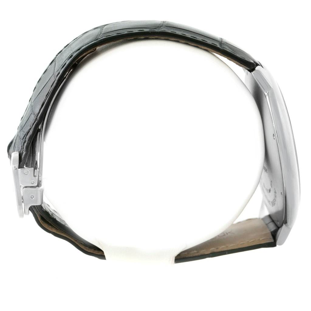 The image shows a side view of a Cartier Ballon Bleu W6920055 Men's White Gold Silver Dial W6920055 Men's White Gold Silver Dial watch, highlighting its case, strap, and buckle.