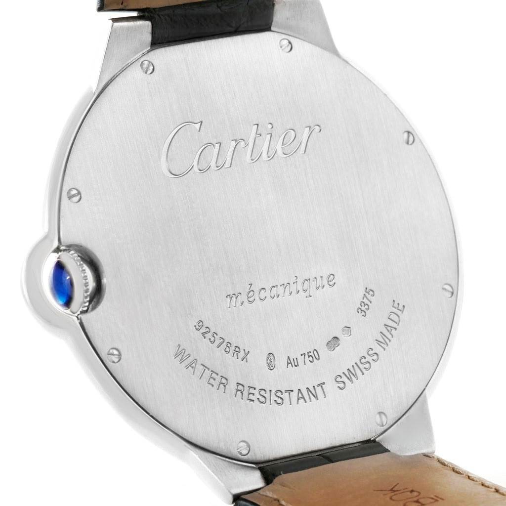 The image shows the back of a Cartier Ballon Bleu W6920055 Men's White Gold Silver Dial W6920055 Men's White Gold Silver Dial watch, highlighting the case back and the blue cabochon crown.