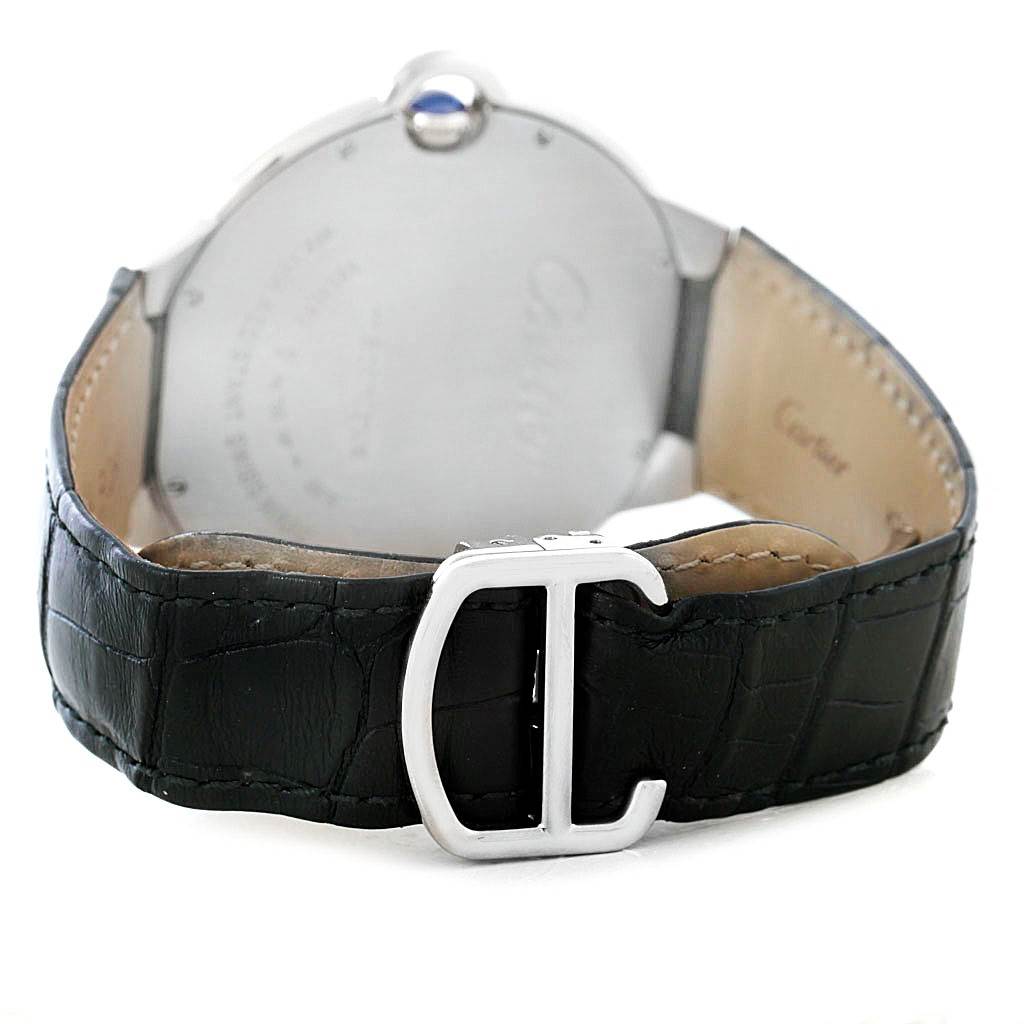 This image shows the back of a Ballon Bleu model by Cartier, focusing on the black leather strap and metal clasp.