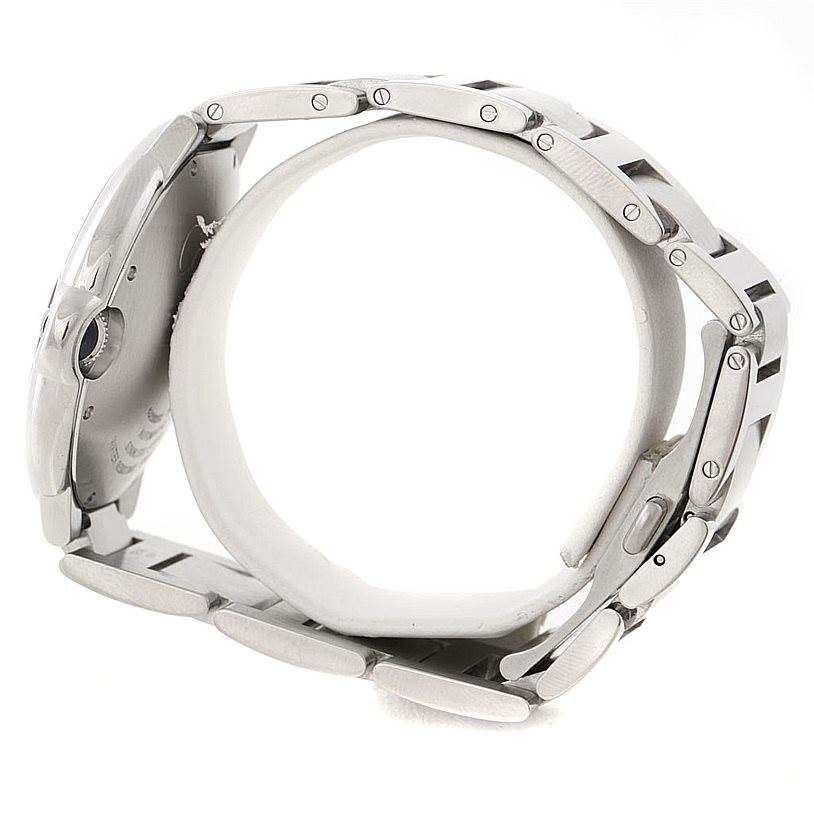 The image displays a side view of the Cartier Ballon Bleu W69012Z4 Men's Stainless Steel Silver Dial W69012Z4 Men's Stainless Steel Silver Dial watch, focusing on the case, crown, and bracelet links.