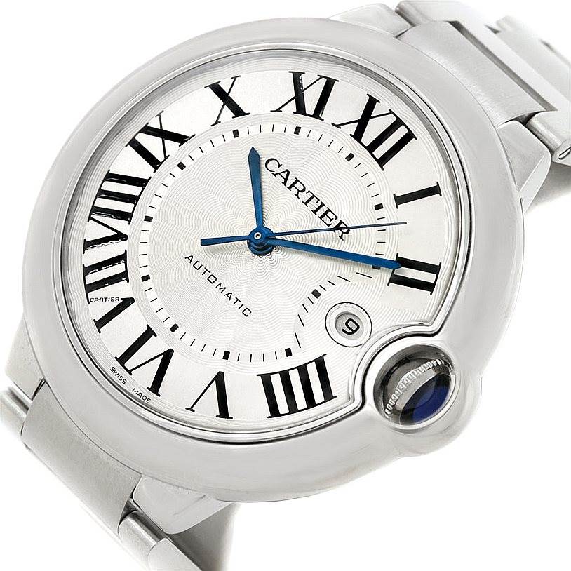 This Cartier Ballon Bleu W69012Z4 Men's Stainless Steel Silver Dial W69012Z4 Men's Stainless Steel Silver Dial watch is shown from a slightly tilted angle, featuring its dial, blue hands, Roman numerals, and signature cabochon crown.