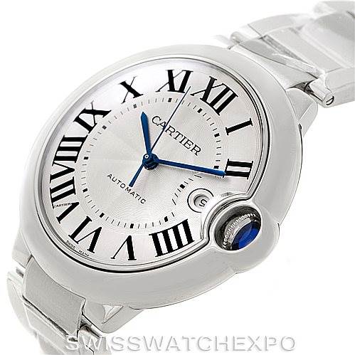 The image shows a Cartier Ballon Bleu W69012Z4 Men
s Stainless Steel Silver Dial W69012Z4 Men
s Stainless Steel Silver Dial watch from an angled view, highlighting its dial, Roman numerals, and distinctive crown with a blue cabochon.
