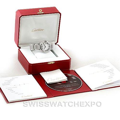 The image shows a Cartier Ballon Bleu W69012Z4 Men
s Stainless Steel Silver Dial W69012Z4 Men
s Stainless Steel Silver Dial watch from a front angle, along with its box, documentation, and a CD.